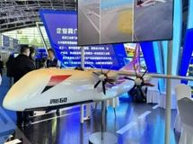 پهپاد غولپیکر ۶۰ تُنی چین وارد میدان شد/ جابجایی بالگرد و کانتینرهای نظامی با پهپاد